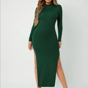 Long green dress with side slits and turtle neck
